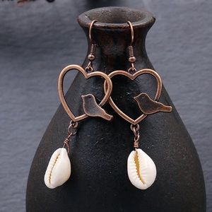 New Bronze bird perched on a heart shell vintage inspired boho bohemian earrings